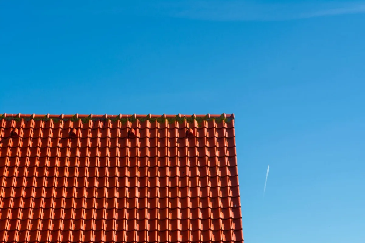 Tile roof gable in full sun, the kind of exposure that sets roof life in Prescott, AZ